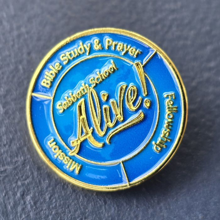 Bible study and prayer pin with Sabbeoy School Alive! logo and fishing rod design.